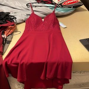 Francesca’s red strapped dress